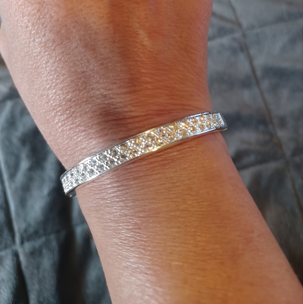 Very pretty rhinestone silver bracelet, has magnetic closure